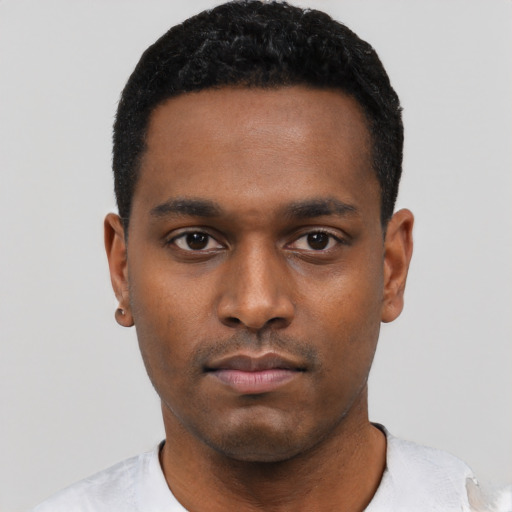 Neutral black young-adult male with short  black hair and brown eyes