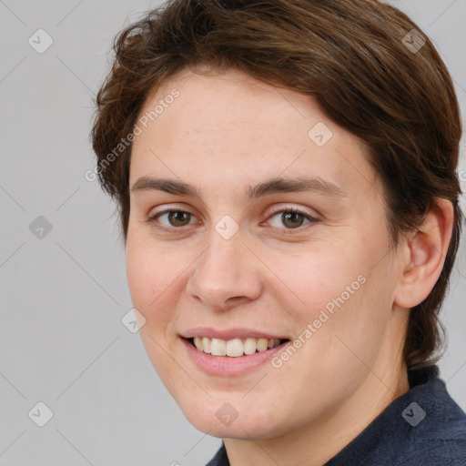 Joyful white young-adult female with medium  brown hair and brown eyes