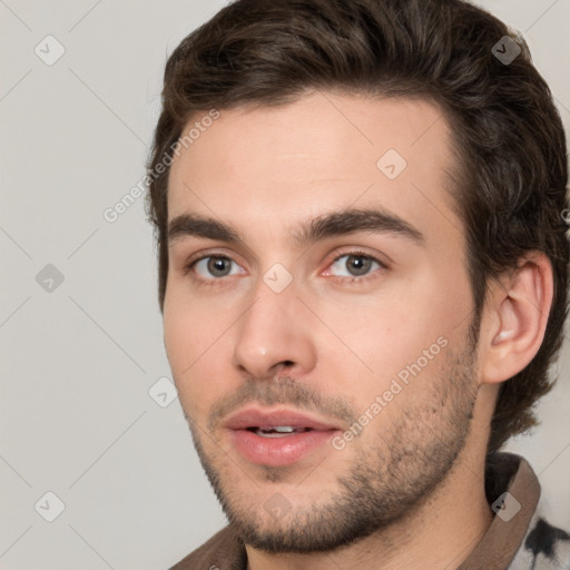 Neutral white young-adult male with short  brown hair and brown eyes