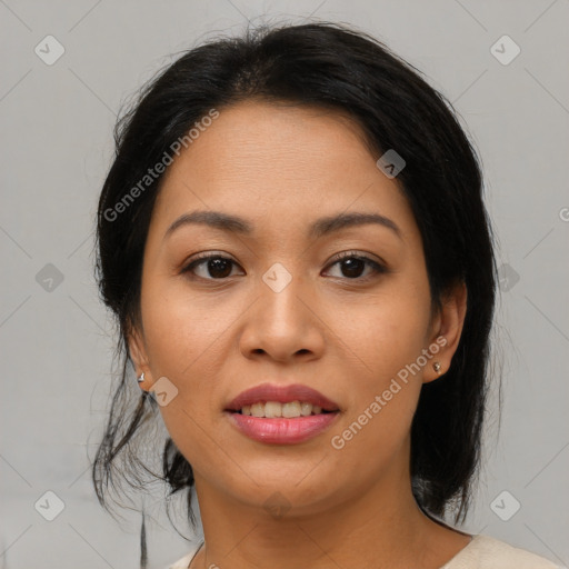 Joyful asian young-adult female with medium  brown hair and brown eyes