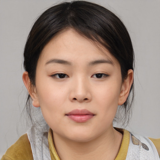 Neutral asian young-adult female with medium  brown hair and brown eyes