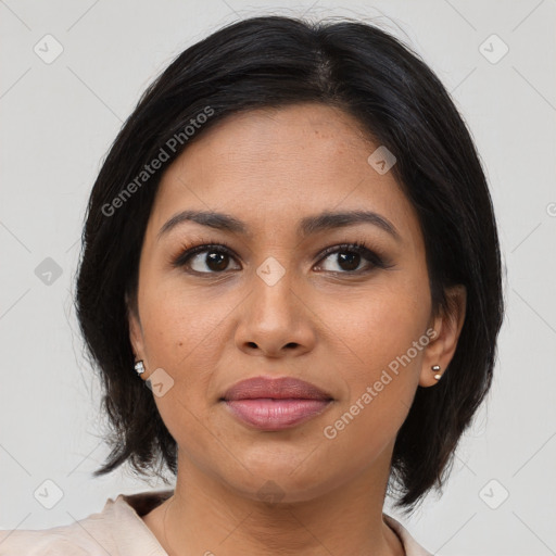 Joyful latino young-adult female with medium  brown hair and brown eyes