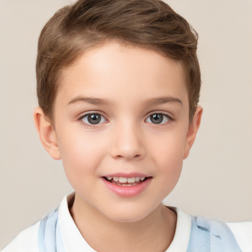 Joyful white child female with short  brown hair and brown eyes