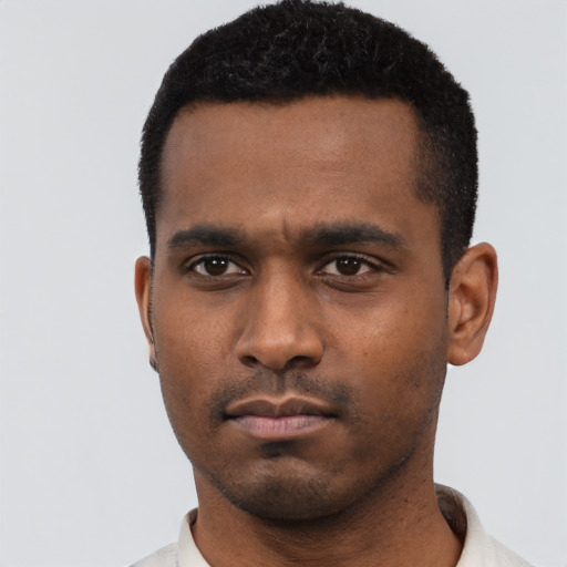 Neutral black young-adult male with short  black hair and brown eyes
