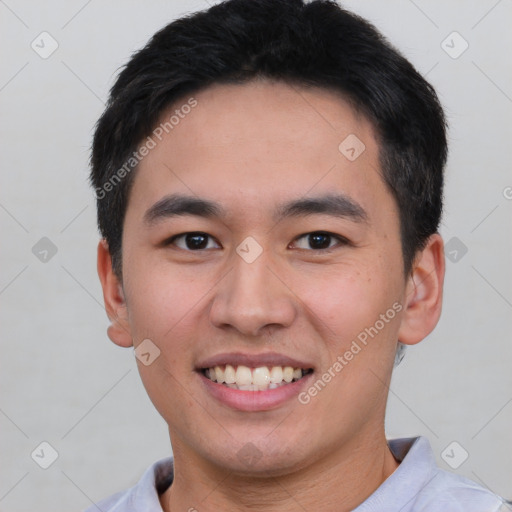 Joyful white young-adult male with short  black hair and brown eyes