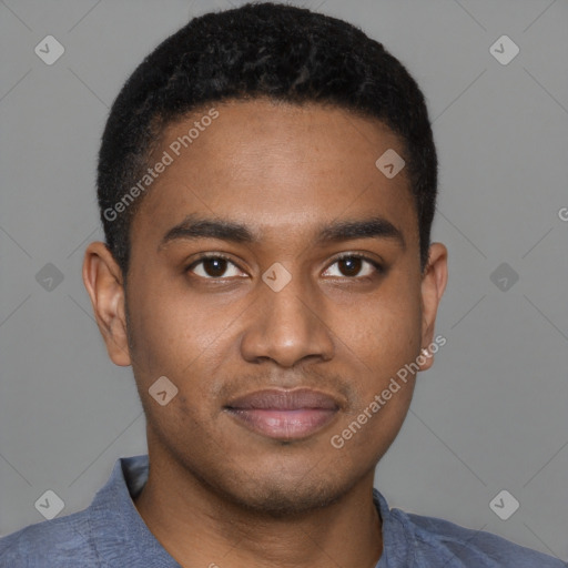 Joyful black young-adult male with short  brown hair and brown eyes