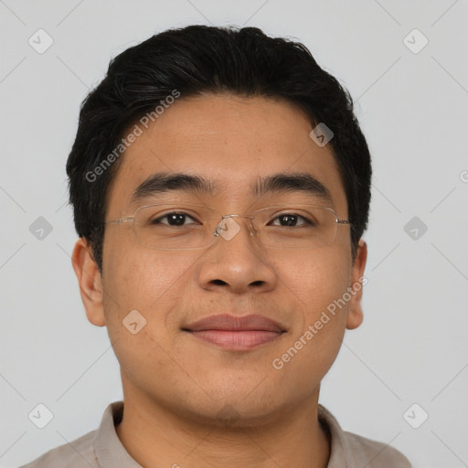 Joyful asian young-adult male with short  brown hair and brown eyes