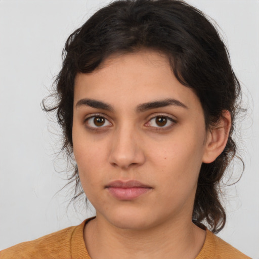 Neutral latino young-adult female with medium  brown hair and brown eyes