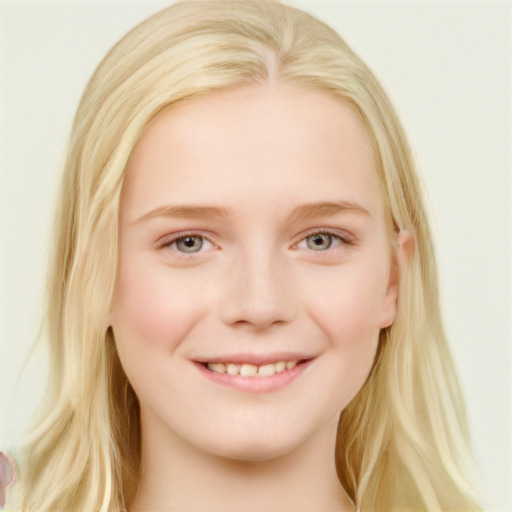 Joyful white young-adult female with long  blond hair and blue eyes