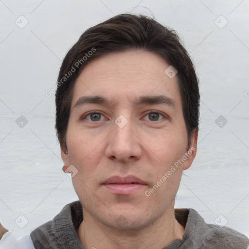 Neutral white adult male with short  brown hair and brown eyes