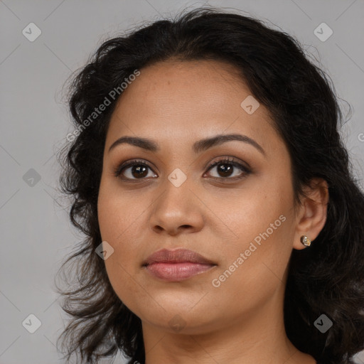 Joyful latino young-adult female with long  brown hair and brown eyes
