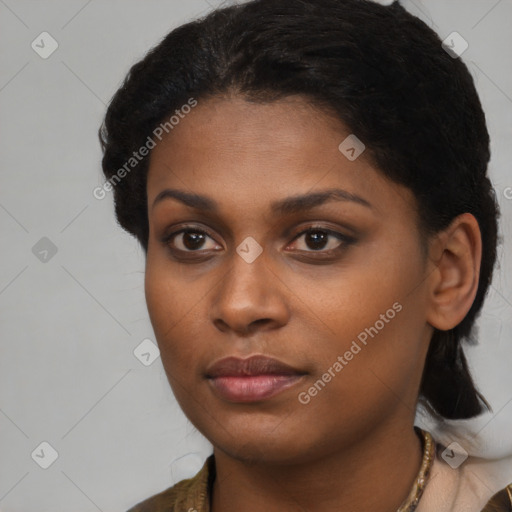 Neutral black young-adult female with short  black hair and brown eyes