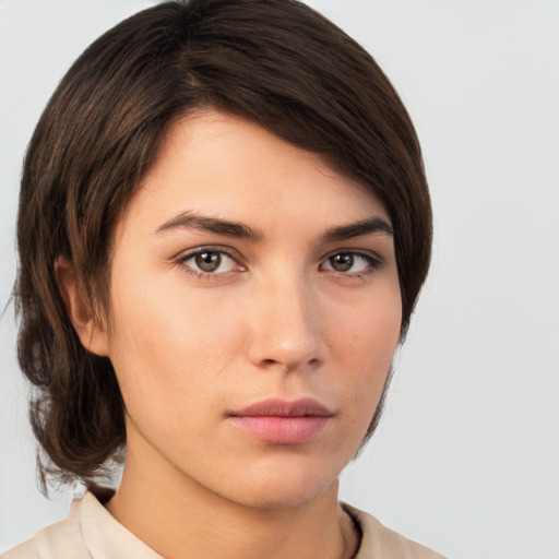 Neutral white young-adult female with medium  brown hair and brown eyes