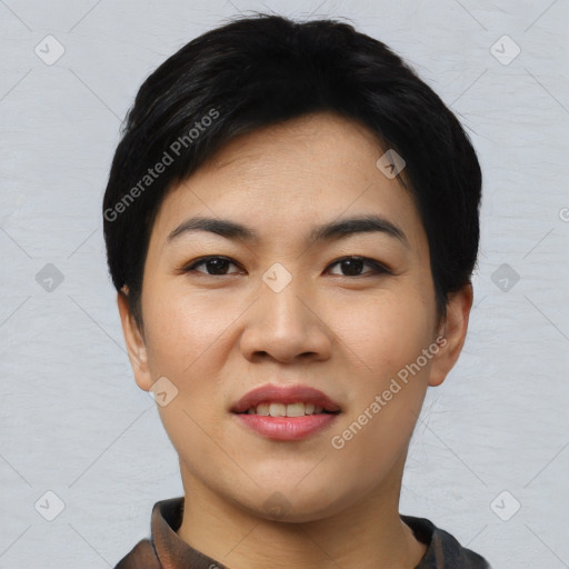 Joyful asian young-adult female with short  black hair and brown eyes