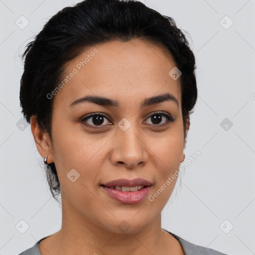 Joyful latino young-adult female with short  brown hair and brown eyes