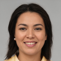 Joyful asian young-adult female with medium  brown hair and brown eyes