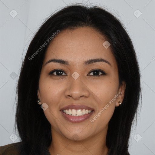 Joyful latino young-adult female with long  brown hair and brown eyes