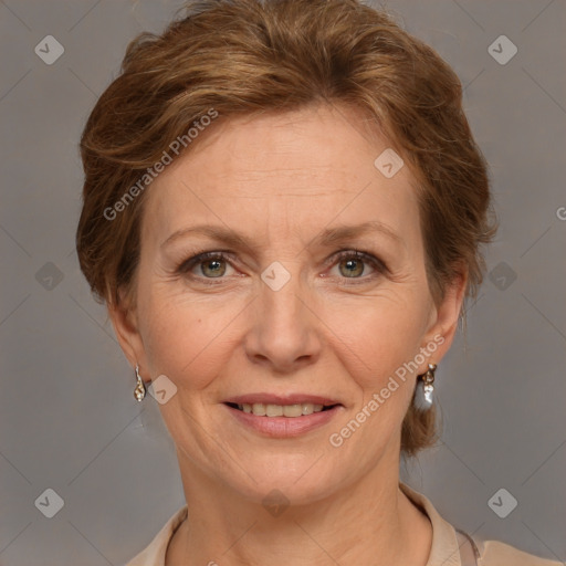 Joyful white adult female with medium  brown hair and grey eyes