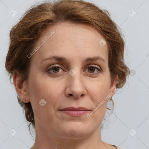 Joyful white adult female with medium  brown hair and green eyes