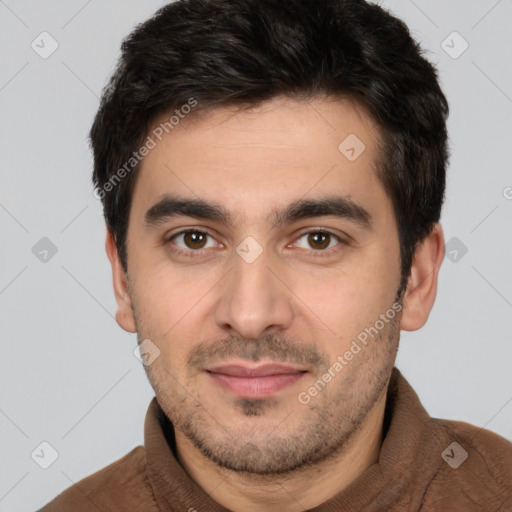 Joyful white young-adult male with short  brown hair and brown eyes