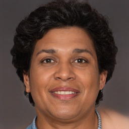 Joyful white adult female with short  brown hair and brown eyes
