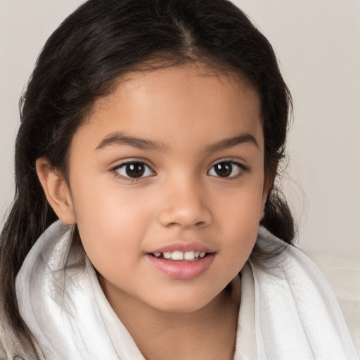 Joyful white child female with medium  brown hair and brown eyes