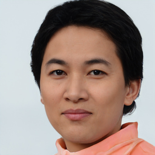 Joyful asian young-adult female with short  black hair and brown eyes