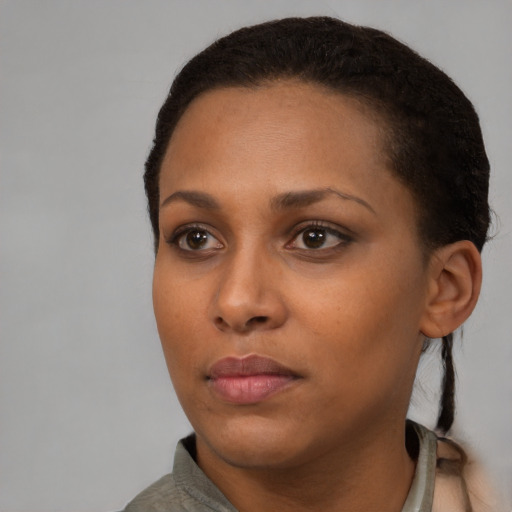 Neutral black young-adult female with short  black hair and brown eyes
