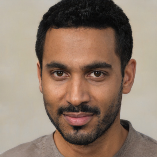 Neutral black young-adult male with short  black hair and brown eyes