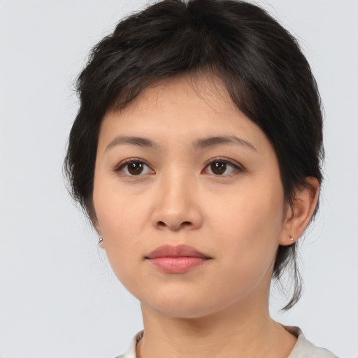 Neutral asian young-adult female with medium  brown hair and brown eyes
