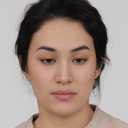 Neutral asian young-adult female with medium  brown hair and brown eyes