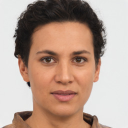 Joyful white adult female with short  brown hair and brown eyes