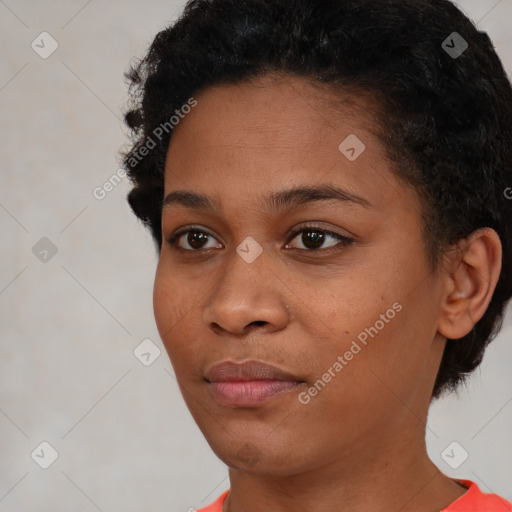 Neutral black young-adult female with short  brown hair and brown eyes