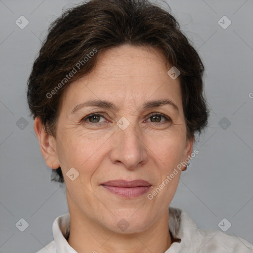 Joyful white adult female with short  brown hair and brown eyes