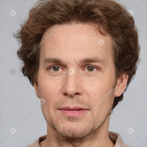 Joyful white adult male with short  brown hair and grey eyes