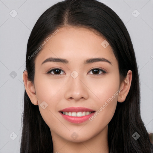 Joyful white young-adult female with long  black hair and brown eyes