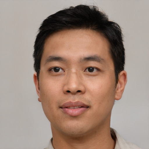 Neutral asian young-adult male with short  black hair and brown eyes