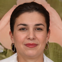 Joyful white adult female with short  brown hair and brown eyes