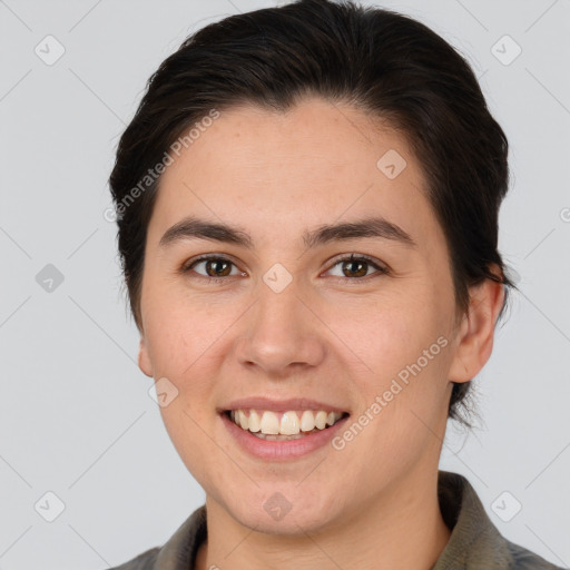 Joyful white young-adult female with medium  brown hair and brown eyes