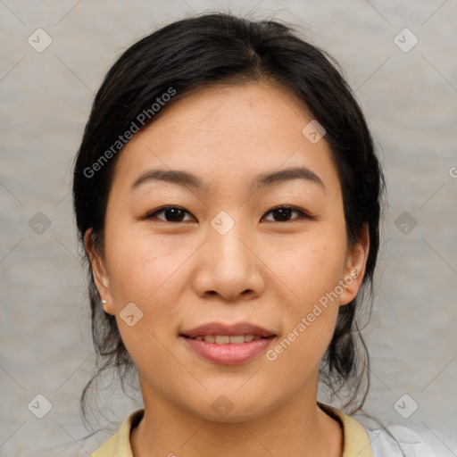 Joyful asian young-adult female with medium  brown hair and brown eyes