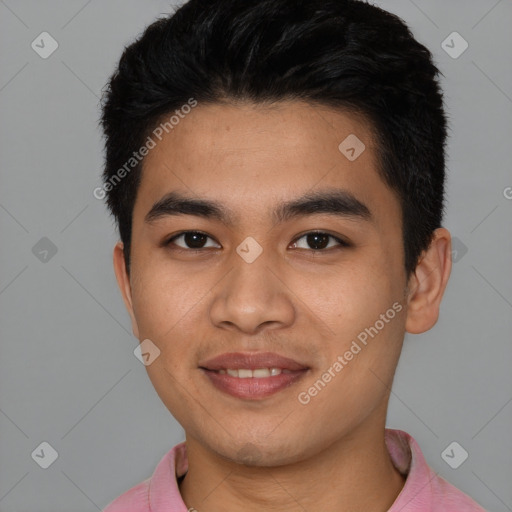 Joyful latino young-adult male with short  black hair and brown eyes