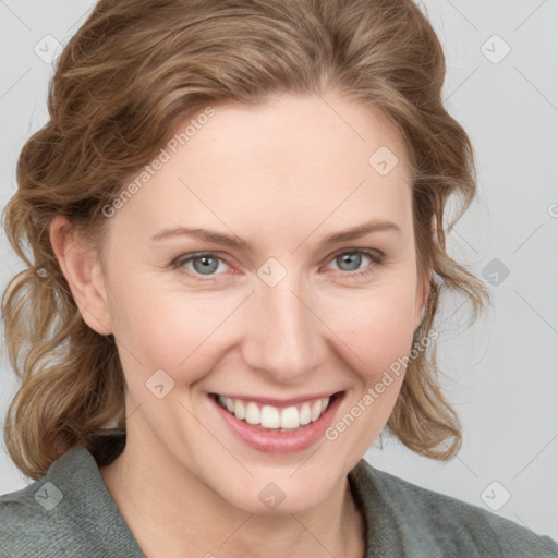 Joyful white young-adult female with medium  brown hair and blue eyes