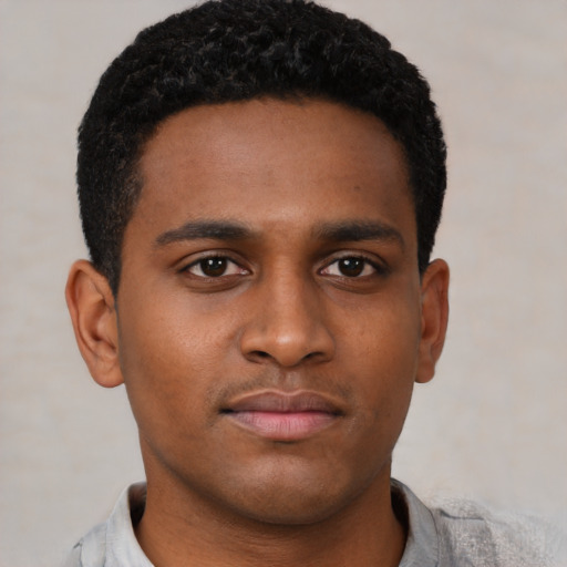 Neutral latino young-adult male with short  brown hair and brown eyes