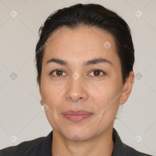 Joyful white adult female with short  brown hair and brown eyes