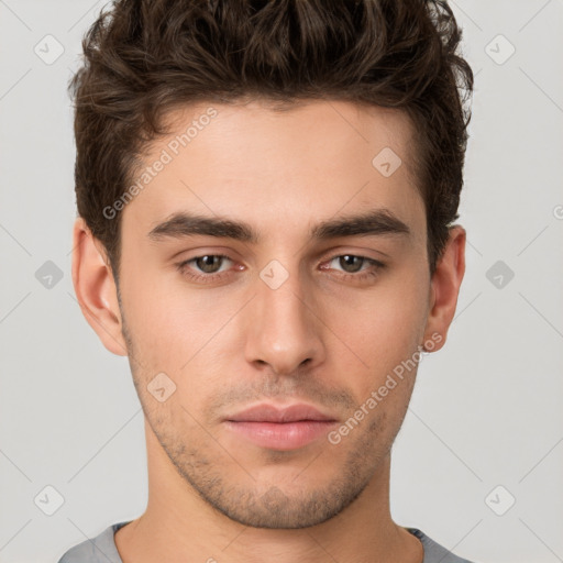 Neutral white young-adult male with short  brown hair and brown eyes