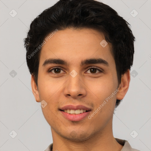 Joyful white young-adult male with short  black hair and brown eyes