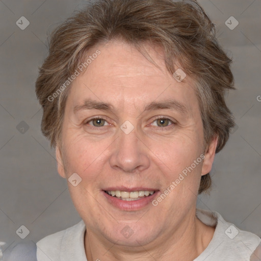 Joyful white adult female with short  brown hair and brown eyes