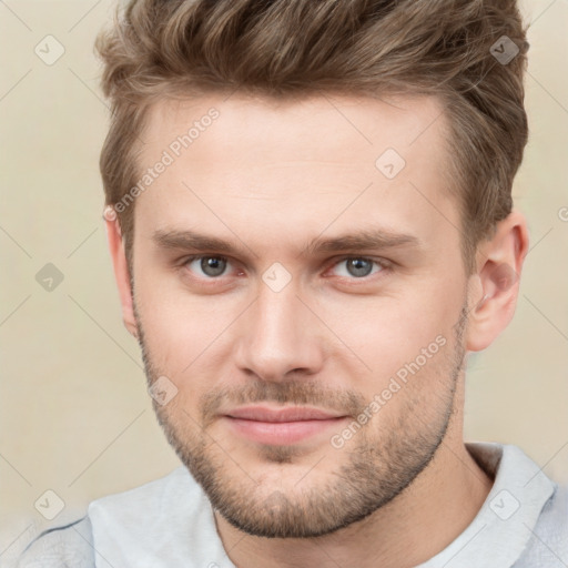 Neutral white young-adult male with short  brown hair and grey eyes