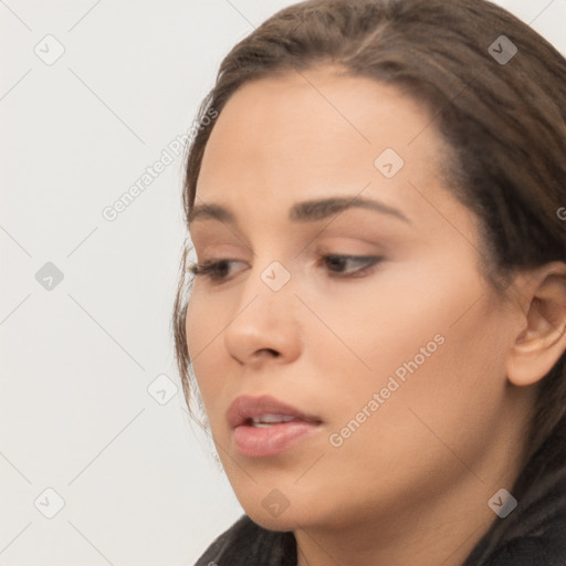 Neutral white young-adult female with long  brown hair and brown eyes