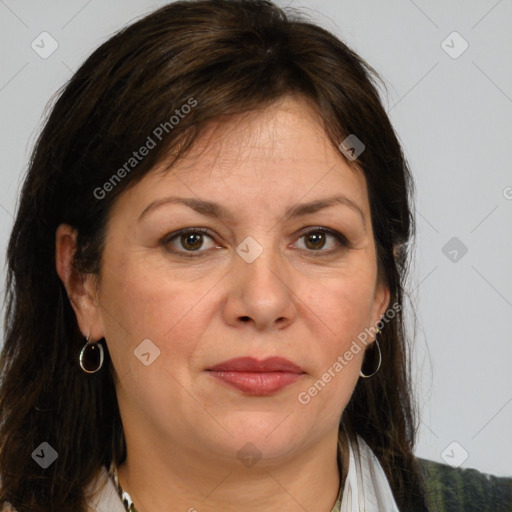 Joyful white adult female with medium  brown hair and brown eyes